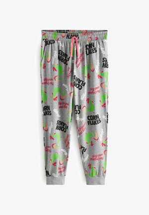 Szare bawełniane spodnie dresowe z powtarzającym się wzorem zielonych grafik kogutów oraz napisem "CORN FLAKES" w czerni i czerwieni. Elastyczny pas z różowym sznurkiem.