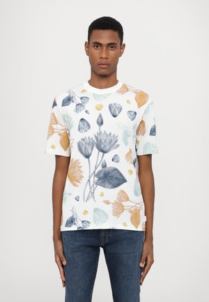 Short-sleeve white t-shirt featuring a floral print in blue, orange, and green tones. Fabric has a textured, breathable appearance.