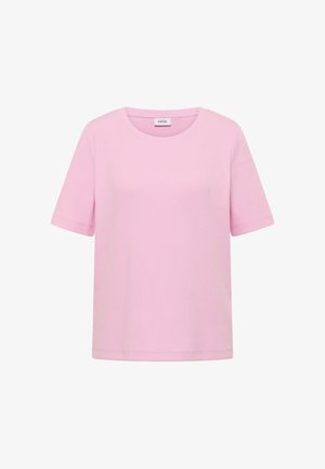 T-shirt rose clair à manches courtes, col rond côtelé, ourlet droit avec une étiquette « CECIL » à l'intérieur du col.