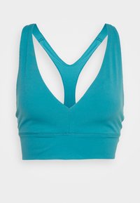 Soutien desportivo azul petróleo com um decote em V profundo, design de costas nadador e tecido suave. Apresenta costuras planas e um comprimento cropped.