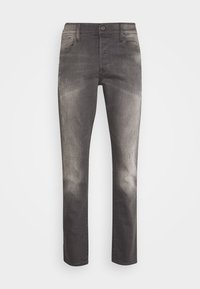 Vaqueros de mezclilla gris con corte recto, con un ligero desgaste, cinco bolsillos y cierre de botón. Textura uniforme sin patrones visibles.