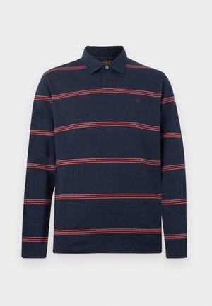 Marineblauw poloshirt met lange mouwen, een kraag en rode horizontale dubbele strepen over het lichaam en de mouwen.