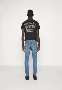 Levi's® 512™ SLIM TAPER - Calças de ganga justas - tabor crumble