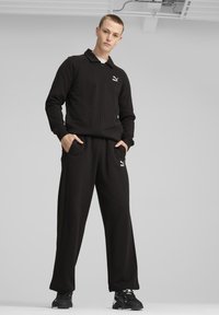 Puma RELAXED TRACK PANTS - Tepláky - black black
