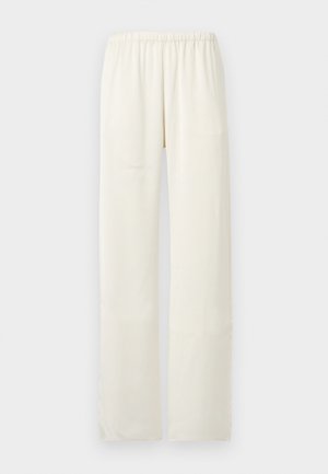 Pantalon droit de couleur crème avec une ceinture élastique, sans poches visibles ni ornements.