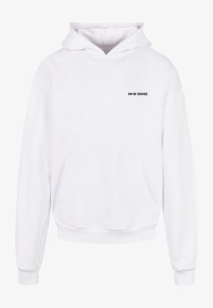 Valge kapuutsiga pusakas, ees ees känguru taskuga, elastsete mansettidega ja vasakus rinnakus olev väikese musta tekstiliste logoga "9N1M SENSE".