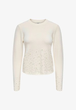 Cremefarbener Langarmpullover mit rundem Ausschnitt, der auf der unteren Hälfte mit verstreuten Perlen- und Schmucksteinverzierungen versehen ist.