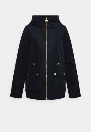 Black hooded jacket with front gold zipper, two flap pockets with gold snap buttons, and adjustable drawstrings at waist sides.