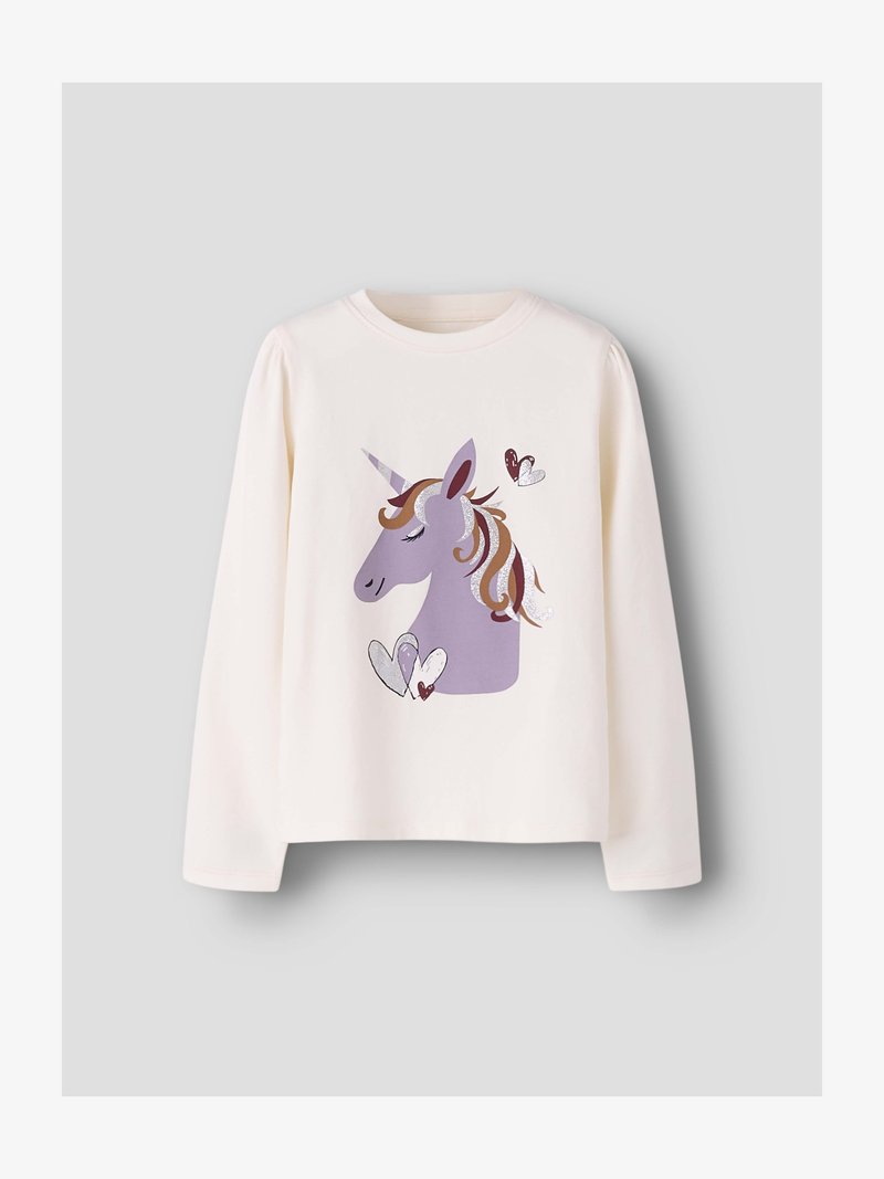 Κρεμ πουκάμισο μακρυμάνικο με μοβ κεφάλι μονόκερου, κυματιστή χαίτη, κλειστά μάτια και τρεις διακοσμητικές καρδιές γύρω του.