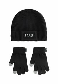 Schwarze gestrickte Mütze mit Logo-Patch und passenden schwarzen Handschuhen. Die Handschuhe haben graue Spitzen an den Fingern. Durchgehende gerippte Struktur.