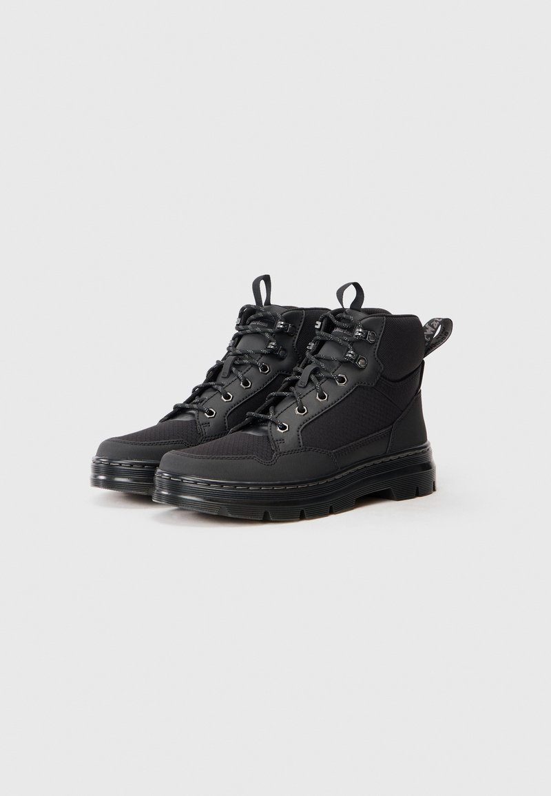 Black hiking boots featuring rugged fabric and leather upper, lace-up front, padded collar, pull tab, and textured rubber sole.