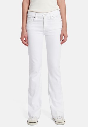 Witte uitlopende jeans met een mid-rise taille, gemaakt van katoen denim. Bevat voorzakken, een klassieke rits en kleine metalen accenten.
