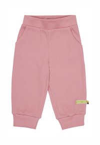 Roze broek van waffle-textuur met een zachte tailleband, zijzakken en geribbelde boorden. Heeft een groen merklabel aan de zijkant.
