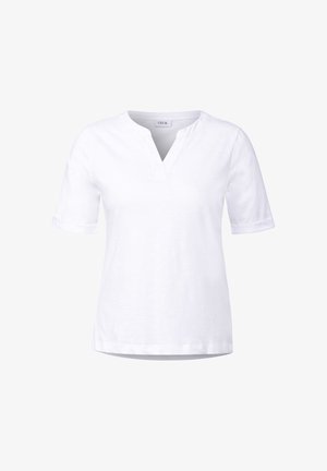 Weißes Kurzarmoberteil mit V-Ausschnitt, aus weichem Stoff gefertigt, mit aufgerollten Ärmeln und lockerer Passform, vor einem neutralen Hintergrund präsentiert.