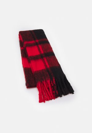 Folded red and black checkered wool scarf with fringed ends on a white background.