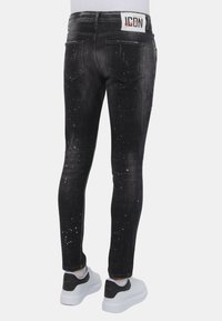 Local Fanatic PAINT SPLATTER DESTROY STOASH - Jeans Skinny Fit - zwart