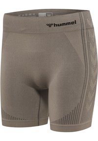 Korta sportshorts i ljusbrunt, tillverkade av ett texturerat material. Har en ribbad midja och perforerade detaljer på sidorna.