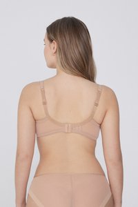 Béžová podprsenka s nastavitelnými ramínky, zapínáním na háček a oko a průhlednými síťovanými panely. Hladká tkanina s minimálními detaily a bez vycpávek.