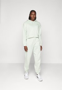 adidas Sportswear ENERGIZE - Tracksuit - linen green