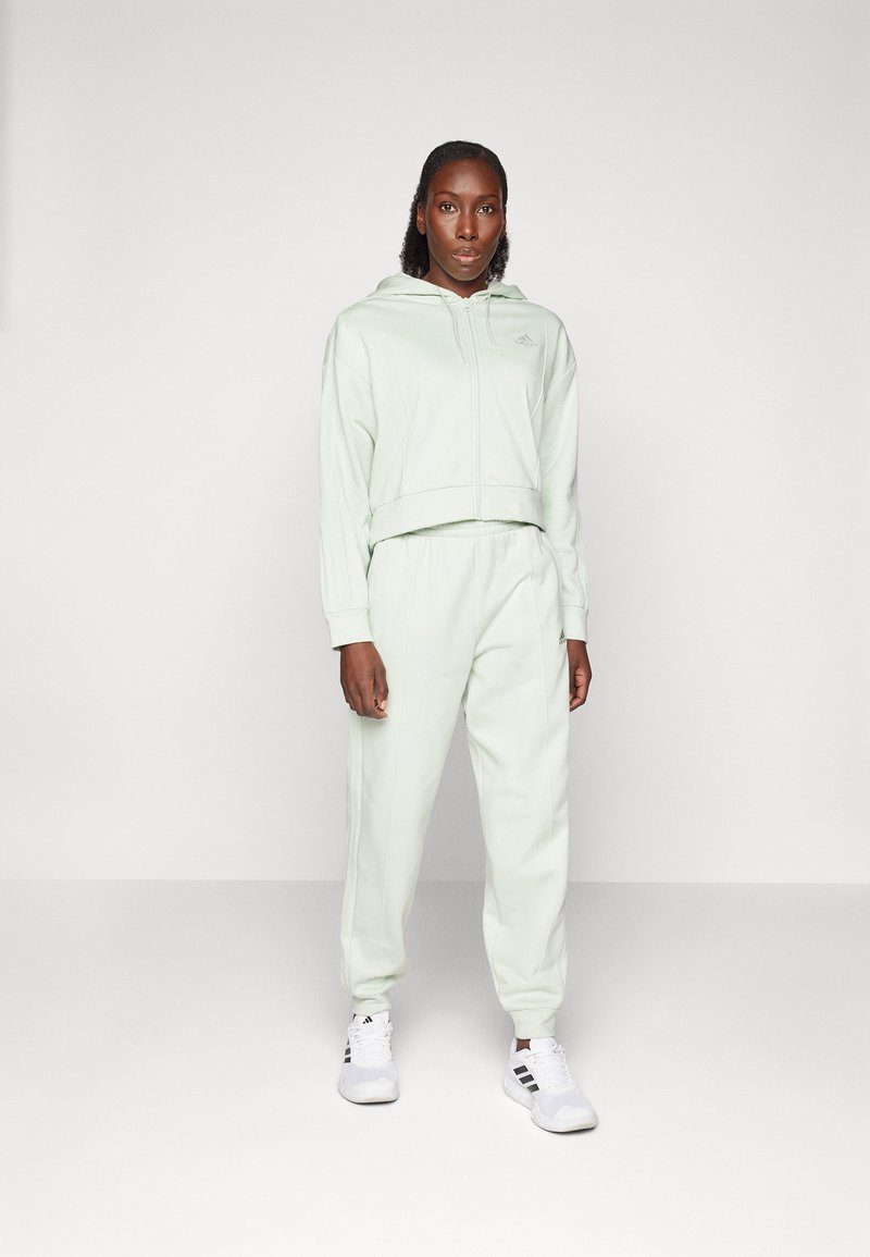adidas Sportswear ENERGIZE - Tracksuit - linen green