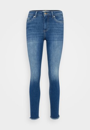 Slim fit jeans i denim med en medelblå tvätt, femfickdesign, subtila blekningar och fransad kant vid ankeln.