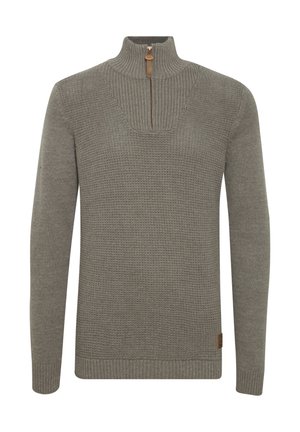 Grey knitted sweater with a high-neck collar, half-zip closure, and ribbed cuffs. Features textured fabric and a small logo accent on the hem.