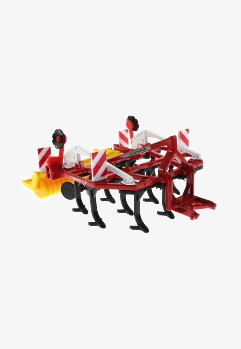 Red and black model plow with yellow front, white and red warning stripes, and several black tines for soil cultivation.