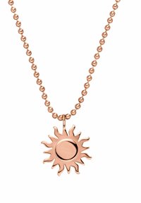 Roze gouden ketting met een hanger in de vorm van een zon, met een ronde center en golvende stralen, hangend aan een parelkettinkje.