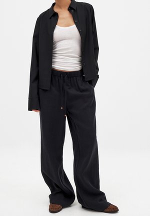 NA-KD WIDE LEG MID WAIST - Auduma bikses - black