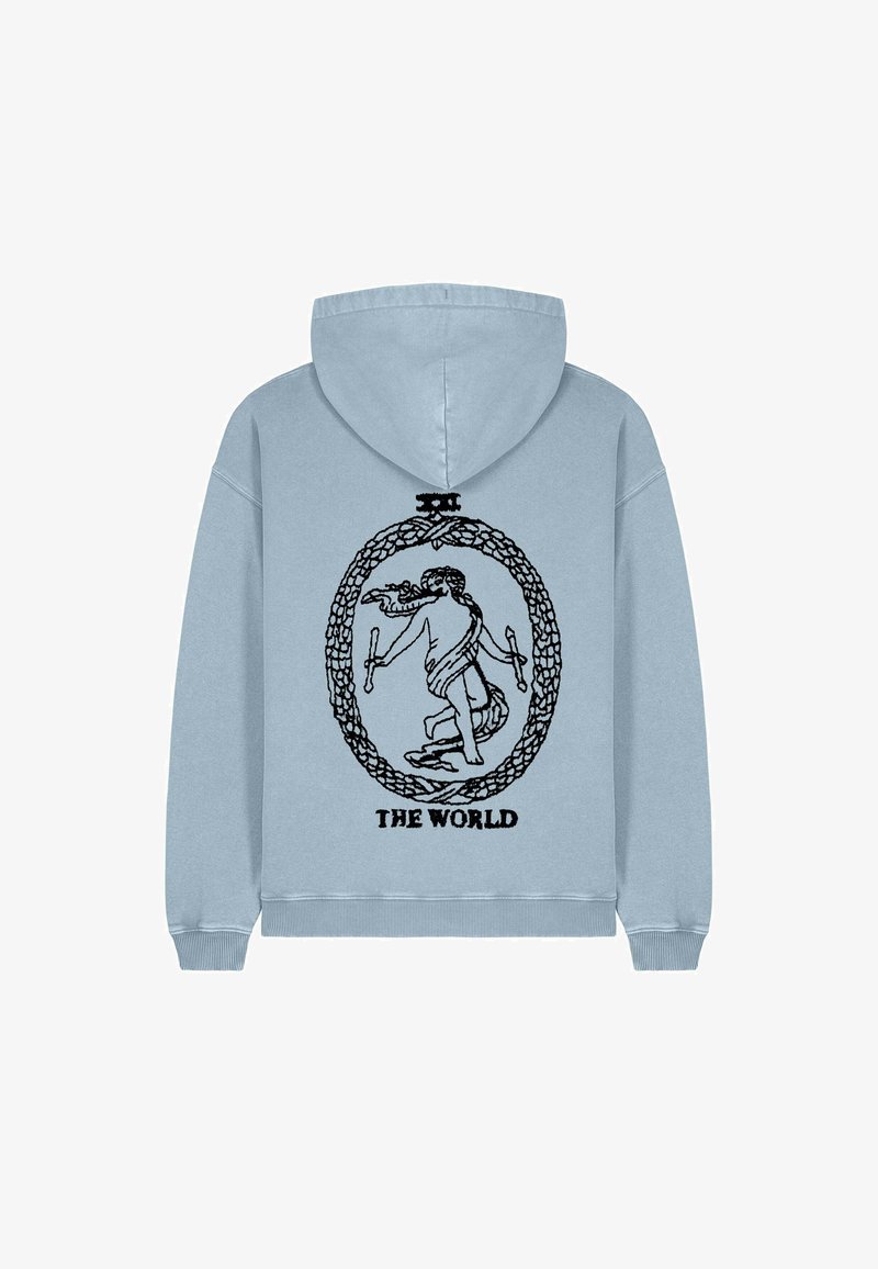 Hoodie bleu clair avec un graphique noir représentant une figure à l'intérieur d'un design de corde circulaire, avec le texte "LE MONDE" en bas.