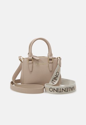 Beige leather handbag with dual handles, gold hardware, and a decorative strap featuring "VALENTINO" in bold letters. Compact rectangular shape.
