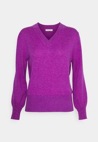 Pull violet à col en V avec manches longues légèrement bouffantes. Fabriqué en maille texturée, avec un ourlet et des poignets côtelés.