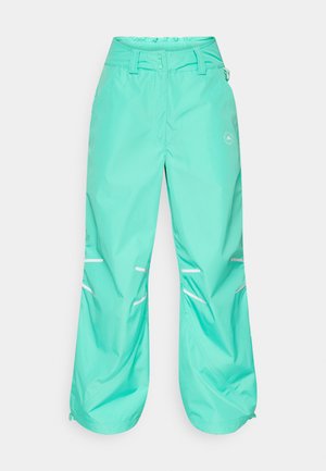 Pantalones impermeables turquesa con un ajuste relajado, cintura ajustable, rayas reflectantes y dobladillos con cremalleras para mayor funcionalidad.