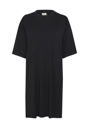 Musta ylipitkä t-paita, joka on valmistettu pehmeästä puuvillasta. Siinä on lyhyet hihat, pyöreä kaula-aukko ja rento istuvuus ilman näkyviä kuvioita tai yksityiskohtia.