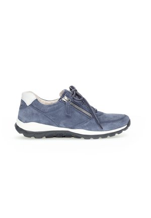 Navy blue suede sneaker with white sole, featuring a front zipper and lace closure. Includes a textured insole and contrasting heel detail.