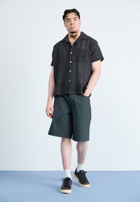 Clae BRADLEY WELT UNISEX - Sporta apavi - black