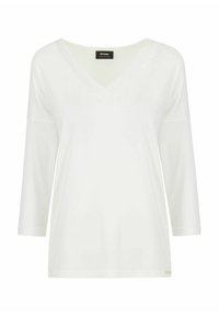 Biały top z dekoltem w kształcie litery V i rękawami o długości trzech ćwierć, wykonany z miękkiego materiału, luźny krój, z małym logotypem przy dolnej krawędzi. Gładka faktura.
