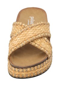 Woven straw slide sandal in light beige, featuring crisscross straps with metallic accents and a cushioned footbed, flat sole.