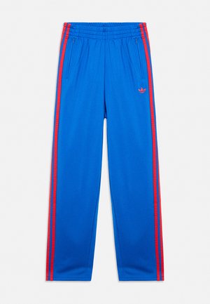 adidas Originals FIREBIRD TRACK PANTS-JUNIOR UNISEX - Παντελόνι φόρμας - blue/semi lucid red