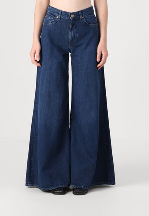 Wide-leg denim jeans in dark blue with a high waist, featuring large back pockets and a slight fade. Classic five-pocket design with silver hardware.