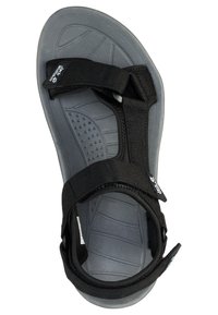 Sandalias de tela negra con una suela de goma texturizada gris que cuenta con una plantilla contorneada y correas ajustables para un ajuste seguro.