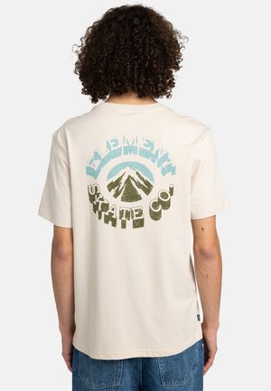 Cream-colored T-shirt featuring a graphic design of mountains with "ELEMENT SKATE CO." text in blue and green, short sleeves, relaxed fit.