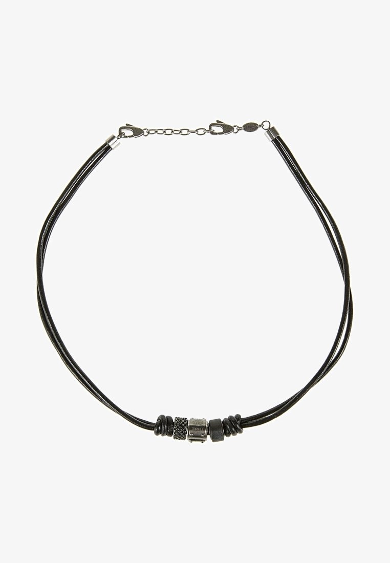 Collier double en cordon noir avec trois perles métalliques centrales et fermoir à chaîne réglable.