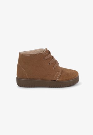 Brown suede ankle boots with lace-up design, soft interior lining, and rubber sole featuring textured tread for grip.