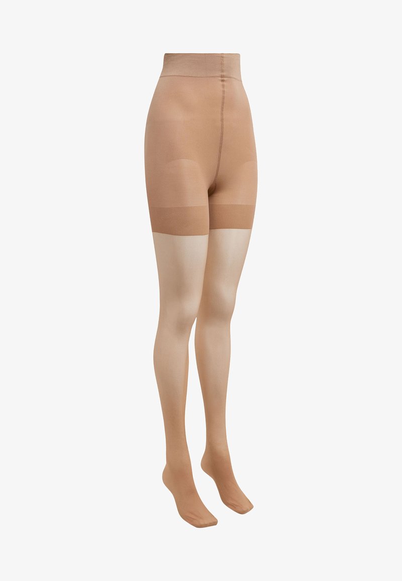 Collants beige au toucher lisse, avec une taille large et des sections de pieds transparents, conçus pour le confort et une apparence naturelle sur les jambes.