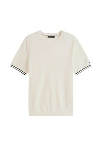 T-shirt crema a maniche corte con dettagli a righe bianco e nero sulle maniche, scollo a costine e morbido cotone.