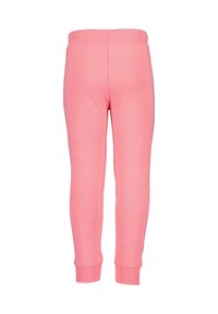 Pink cotton joggers with a ribbed waistband and cuffs. Smooth texture and fitted design, suitable for casual wear.