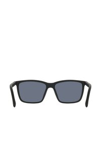 Occhiali da sole neri rettangolari con lenti scure, dotati di finitura opaca e stanghette dritte. Nessun logo o motivo visibile.