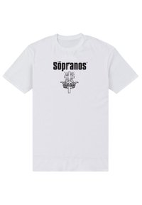 Hvid bomulds t-shirt med "The Sopranos" logo i sort, med et grafisk motiv af en krone og et kors i midten. Klassisk crew neck design.