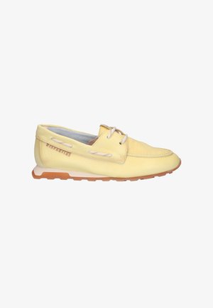Yellow leather boat shoe with white laces, tan rubber sole, and "Hispanitas" logo embossed on the side.
